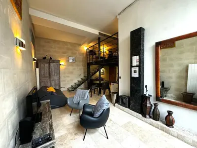 Coin salon dans l'établissement Veda - Loft In The Heart Of Paris - Louvre