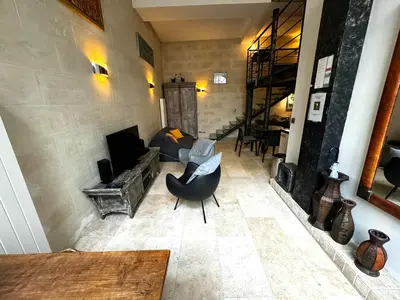Coin salon dans l'établissement Veda - Loft In The Heart Of Paris - Louvre