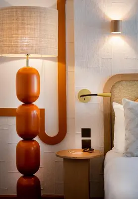Un ou plusieurs lits dans un hébergement de l'établissement Hôtel Le Monna Lisa by Inwood Hotels