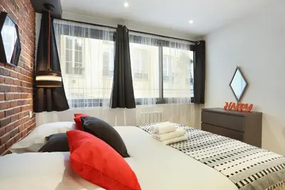 Un ou plusieurs lits dans un hébergement de l'établissement Rent a Room - Residence Blanche