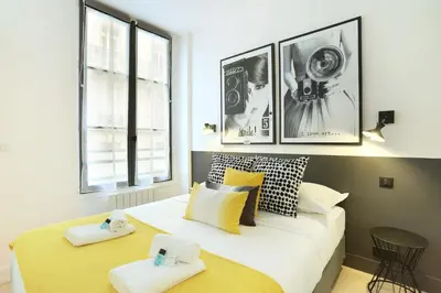 Un ou plusieurs lits dans un hébergement de l'établissement Rent a Room - Residence Blanche