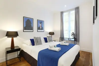 Un ou plusieurs lits dans un hébergement de l'établissement Rent a Room - Residence Blanche