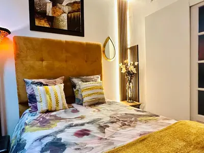 Un ou plusieurs lits dans un hébergement de l'établissement Studio design & comfortable accommodation short breaks
