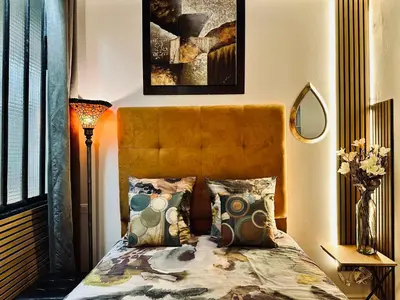 Un ou plusieurs lits dans un hébergement de l'établissement Studio design & comfortable accommodation short breaks
