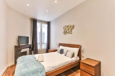 Un ou plusieurs lits dans un hébergement de l'établissement 57-LUXURY PARISIEN HOME SEBASTOPOL 1 (2G)