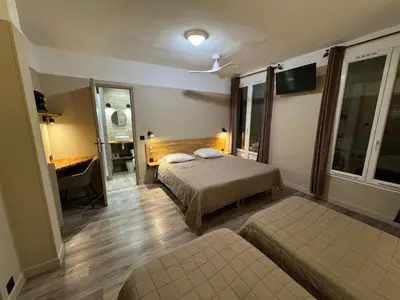 Un ou plusieurs lits dans un hébergement de l'établissement Angleterre Hotel