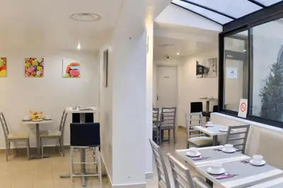 Coin salon dans l'établissement Hôtel Eugénie