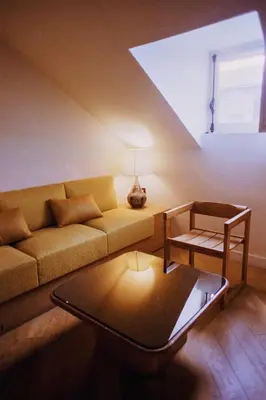 Coin salon dans l'établissement Hotel Habituel