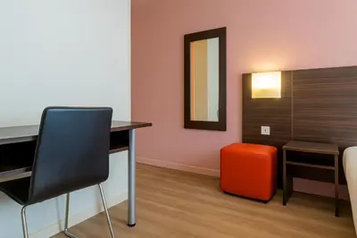Coin salon dans l'établissement Hotel Arc Paris Porte d'Orléans