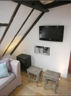 Télévision ou salle de divertissement dans l'établissement SOHO CENTER/MARAIS/POMPIDOU/LOUVRE