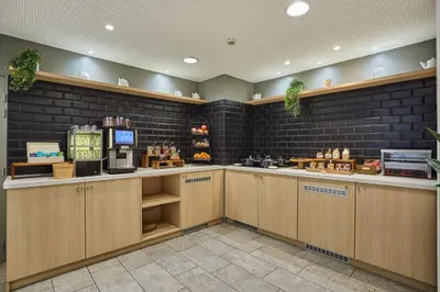 Cuisine ou kitchenette dans l'établissement Appart'hôtel Odalys City - Paris Montmartre