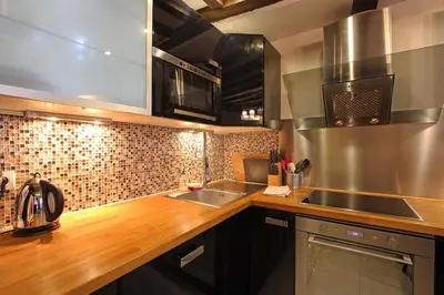 Cuisine ou kitchenette dans l'établissement Appartement spacieux au cœur de Paris 75 m² avec vue sur la ville