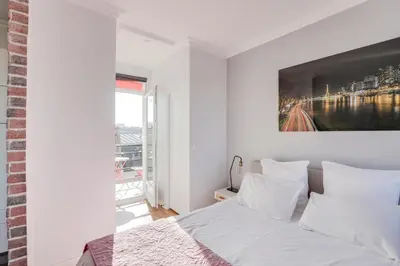 Un ou plusieurs lits dans un hébergement de l'établissement Eiffel Tower view + terrace Saint Germain des Pres