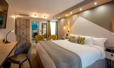 Un ou plusieurs lits dans un hébergement de l'établissement Best Western Plus Opéra Batignolles