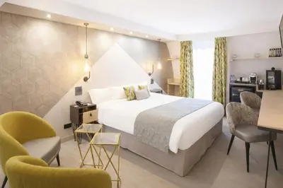 Un ou plusieurs lits dans un hébergement de l'établissement Best Western Plus Opéra Batignolles