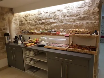 Cuisine ou kitchenette dans l'établissement Hôtel De Venise