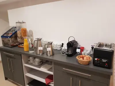 Cuisine ou kitchenette dans l'établissement Hôtel De Venise