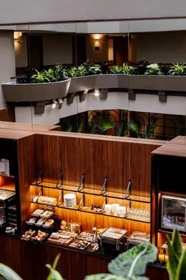 Restaurant ou autre lieu de restauration dans l'établissement Hôtel Paris Neuilly
