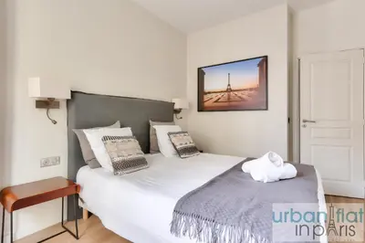 Un ou plusieurs lits dans un hébergement de l'établissement 60-LUXURY PARISIAN HOME SEBASTOPOL (2DG)