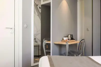 Un ou plusieurs lits dans un hébergement de l'établissement Hotel Sixteen Paris Montrouge