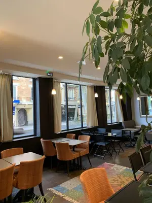 Coin salon dans l'établissement Hotel Sixteen Paris Montrouge
