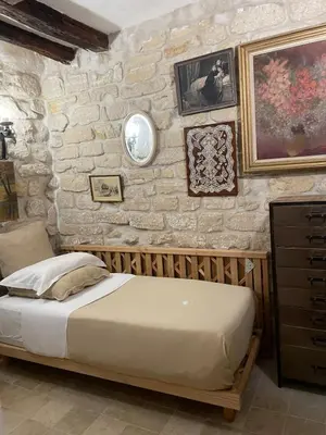 Un ou plusieurs lits dans un hébergement de l'établissement Marais Romantique Paris centre 4 chambres