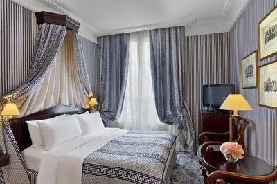 Un ou plusieurs lits dans un hébergement de l'établissement Le Dokhan's Paris Arc de Triomphe, a Tribute Portfolio Hotel