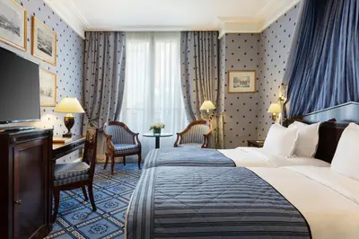 Un ou plusieurs lits dans un hébergement de l'établissement Le Dokhan's Paris Arc de Triomphe, a Tribute Portfolio Hotel