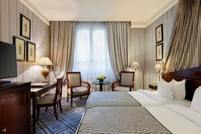Un ou plusieurs lits dans un hébergement de l'établissement Le Dokhan's Paris Arc de Triomphe, a Tribute Portfolio Hotel