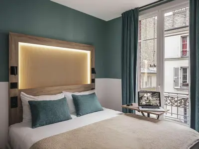 Un ou plusieurs lits dans un hébergement de l'établissement ibis Styles Paris Montmartre Nord