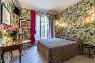 Un ou plusieurs lits dans un hébergement de l'établissement Hôtel De Nice