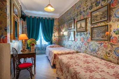 Un ou plusieurs lits dans un hébergement de l'établissement Hôtel De Nice