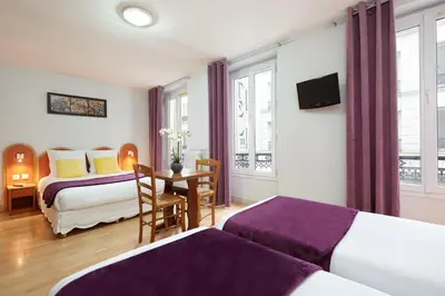 Un ou plusieurs lits dans un hébergement de l'établissement Hôtel Viator