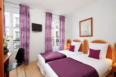 Un ou plusieurs lits dans un hébergement de l'établissement Hôtel Viator