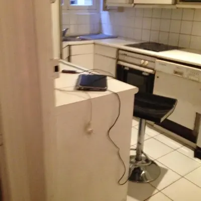 Cuisine ou kitchenette dans l'établissement Toureifelchampselysee