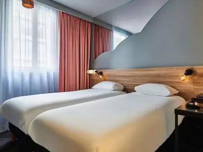 Un ou plusieurs lits dans un hébergement de l'établissement ibis Styles Paris Alesia Montparnasse