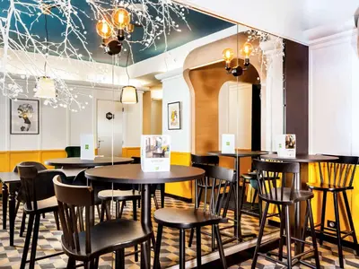 Coin salon dans l'établissement ibis Styles Paris Cadet Lafayette