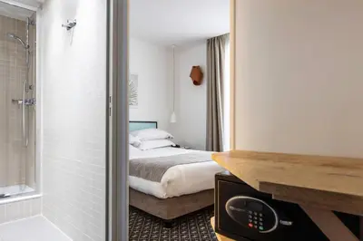 Un ou plusieurs lits dans un hébergement de l'établissement Hotel Palm - Astotel