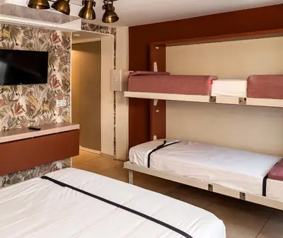 Un ou plusieurs lits dans un hébergement de l'établissement MULTIRESIDENCE L'ELYSEE Paris