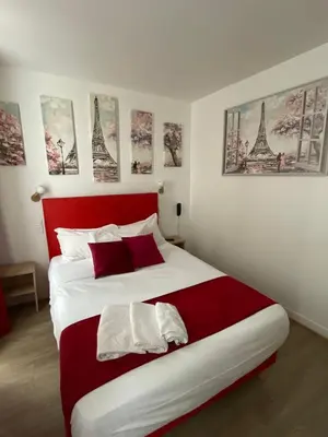 Un ou plusieurs lits dans un hébergement de l'établissement Hôtel de Bordeaux