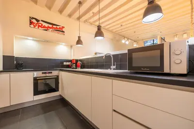 Cuisine ou kitchenette dans l'établissement Duran Duran