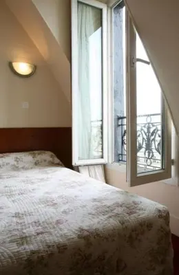 Un ou plusieurs lits dans un hébergement de l'établissement Grand Hôtel De L'Europe