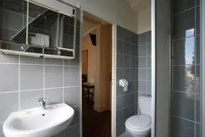 Salle de bains dans l'établissement Grand Hôtel De L'Europe