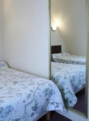 Un ou plusieurs lits dans un hébergement de l'établissement Grand Hôtel De L'Europe