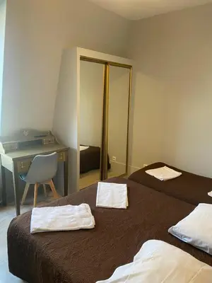 Un ou plusieurs lits dans un hébergement de l'établissement Grand Hôtel De L'Europe