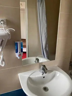 Salle de bains dans l'établissement Grand Hôtel De L'Europe