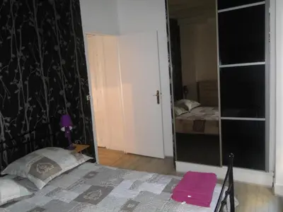 Un ou plusieurs lits dans un hébergement de l'établissement Appartement NOTRE DAME