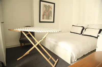 Un ou plusieurs lits dans un hébergement de l'établissement Superb Flat Central Paris