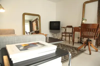 Télévision ou salle de divertissement dans l'établissement Superb Flat Central Paris
