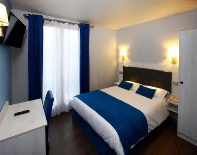 Un ou plusieurs lits dans un hébergement de l'établissement Hôtel Sunny